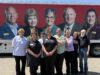 Local Hy-Vee employee honored with Legendary Customer Service Award, picture on semi-trailer